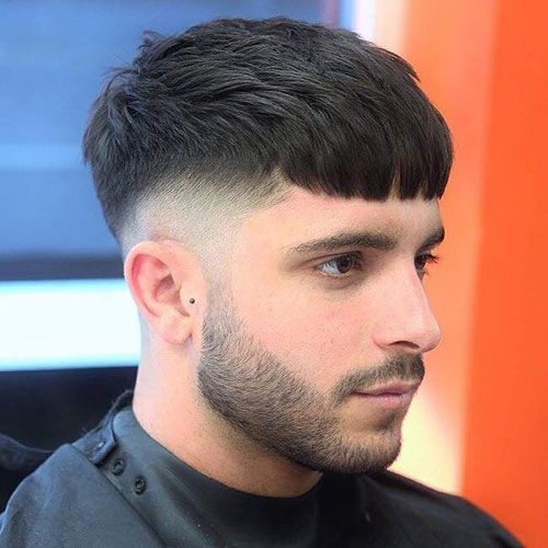 French crop haircut being styled at professional barbershop showing clean fringe and fade