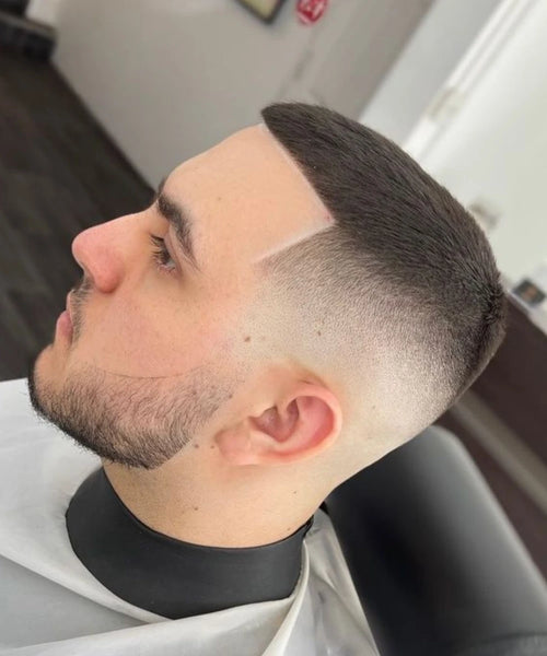 High fade haircut | dramatic high fade starting above temple with bold contrast and maximum impact