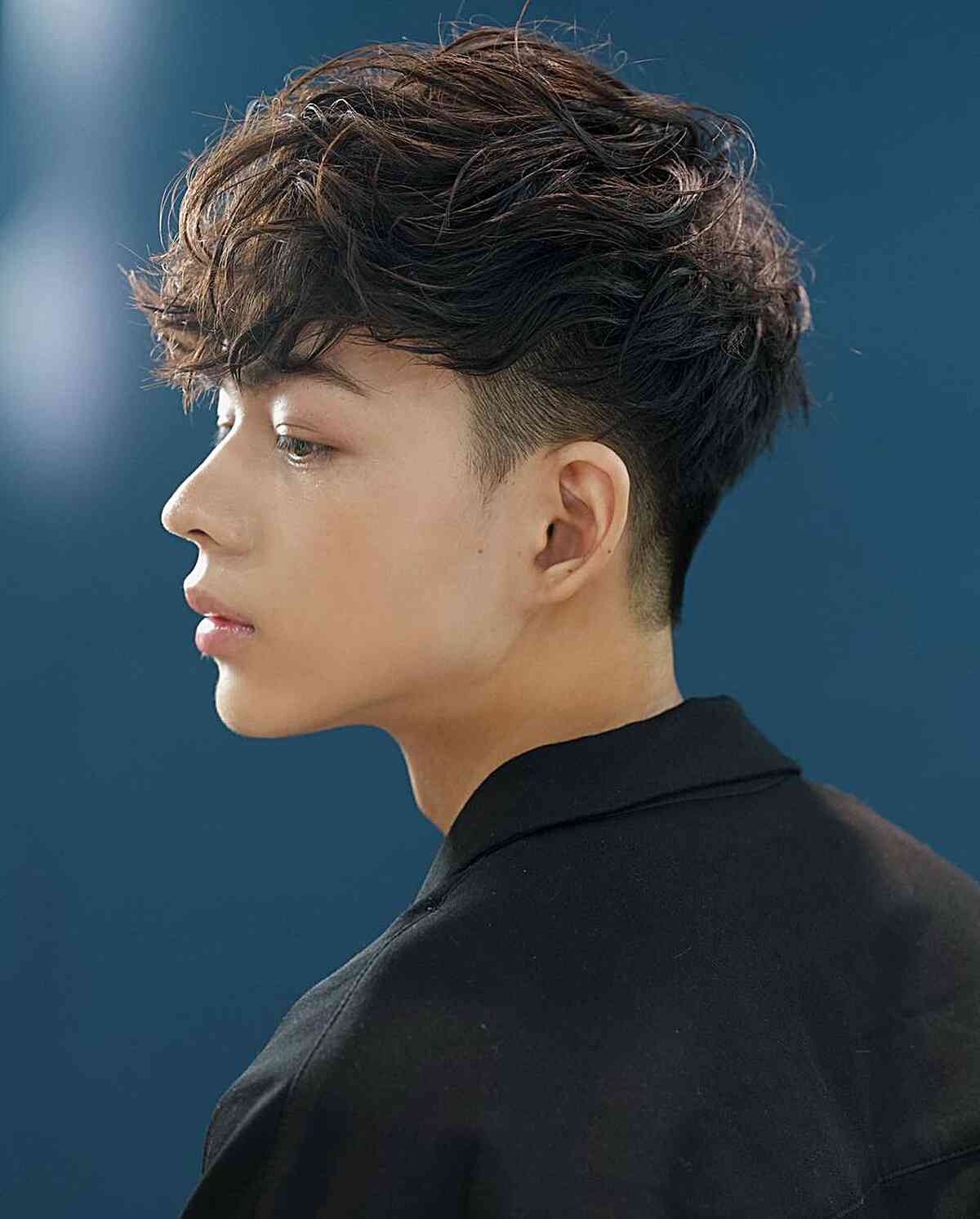 Messy fringe crop with disheveled texture and casual styling mens haircut Queens 2026