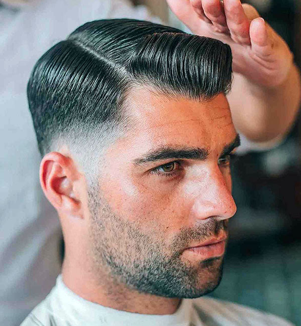 Modern side part fade professional business haircut for men Queens NYC showing contemporary professional style 2026