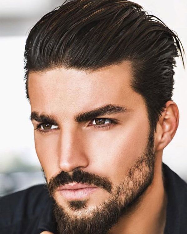 Contemporary slick back professional business haircut Queens NYC showing modern professional slicked style 2026
