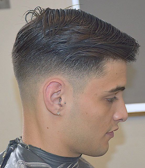 Low taper fade haircut | modern barbershop technique with gradual taper blend for professional mens hairstyle