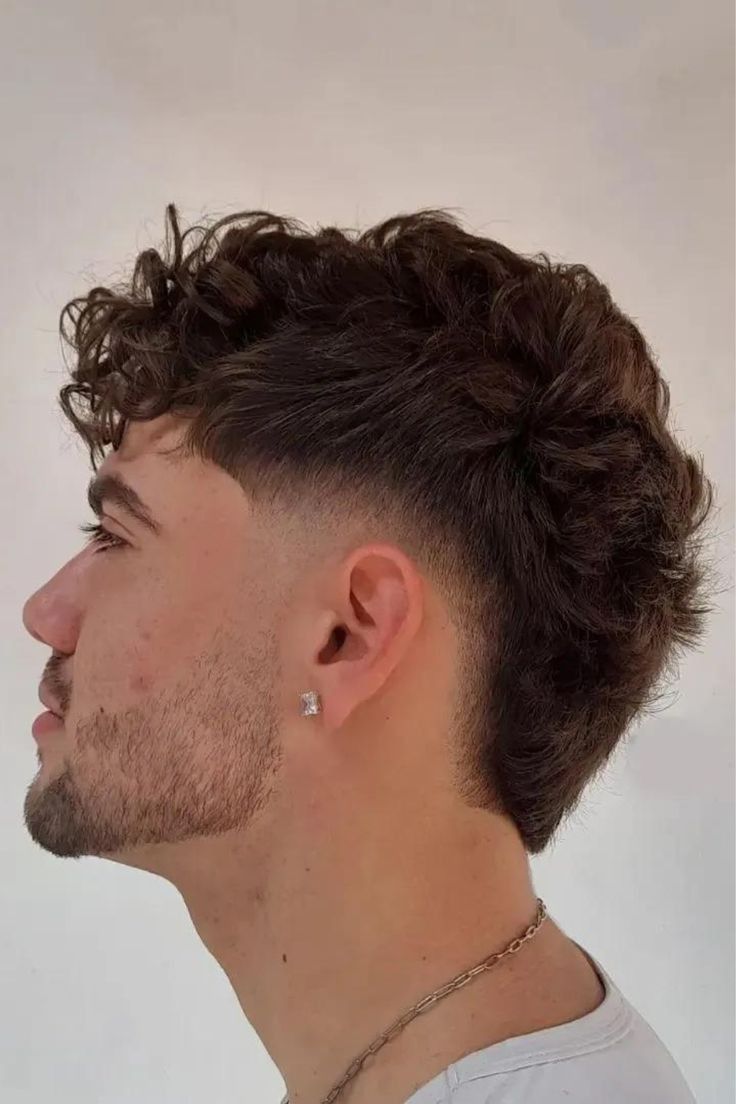 Mid taper fade haircut | mid-level taper fade technique with gradual blend and natural finish trending 2026