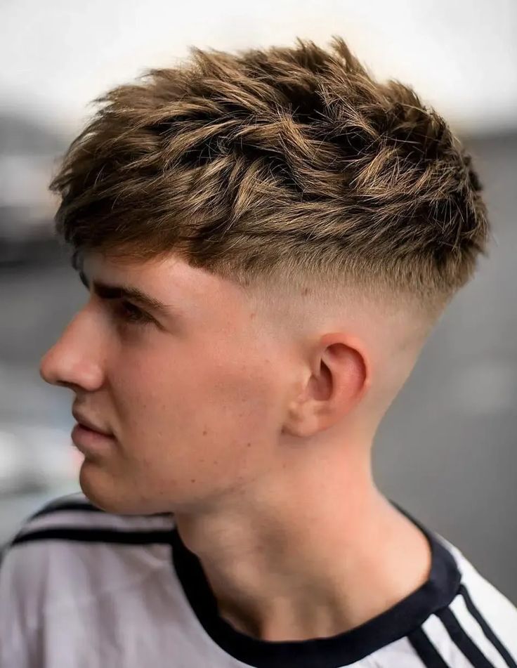 Textured crop with clean fade showing choppy texture and modern blend Queens NYC 2026