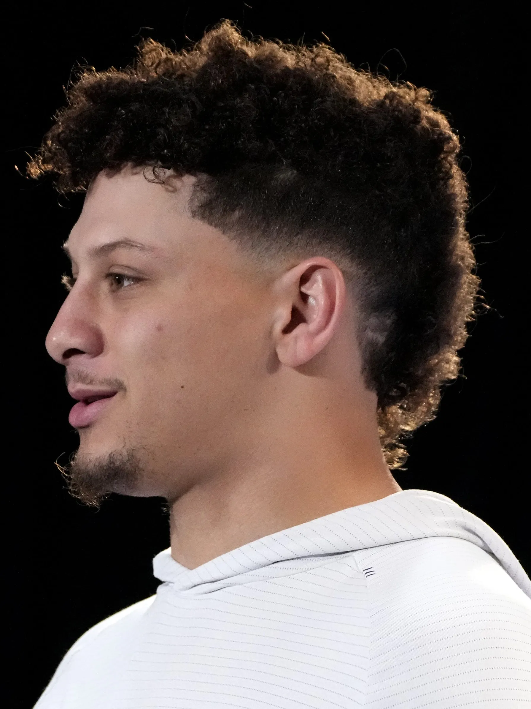 Patrick Mahomes textured quiff hairstyle 2026 with natural volume athletic styling trending haircut Queens NYC
