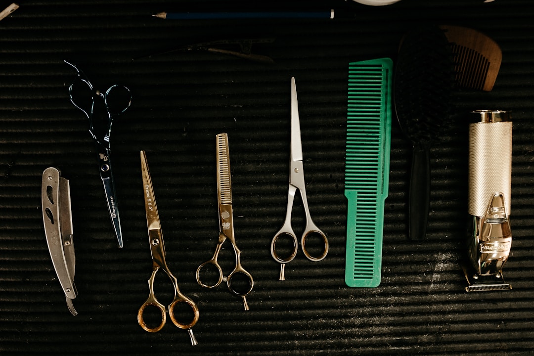 Professional barbering tools demonstrating expert fade cutting techniques for mens professional styles at DIDA NYC Hair Studio Queens