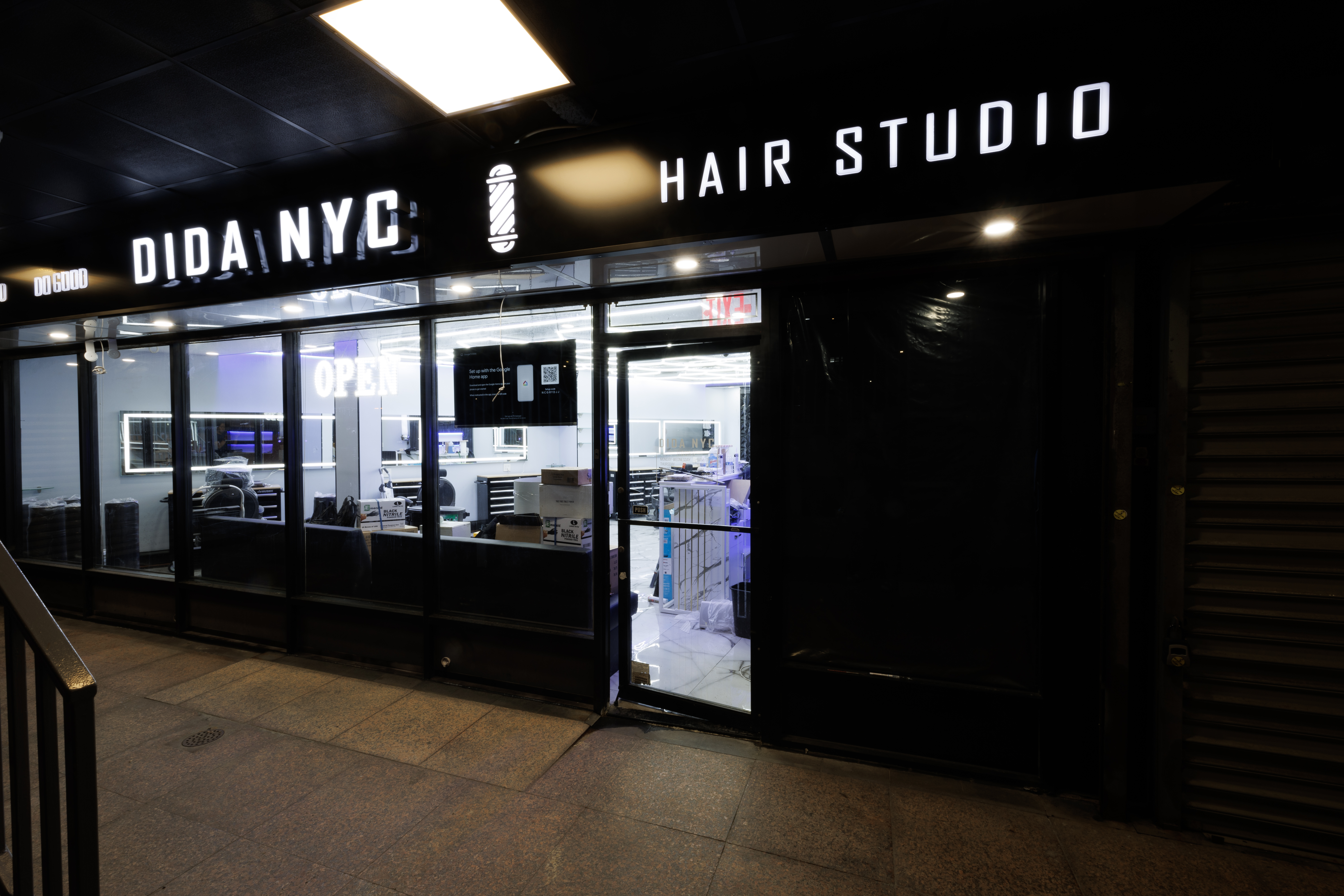 Modern luxury barbershop interior at DIDA NYC Hair Studio in Queens - premium barber chairs and professional grooming environment