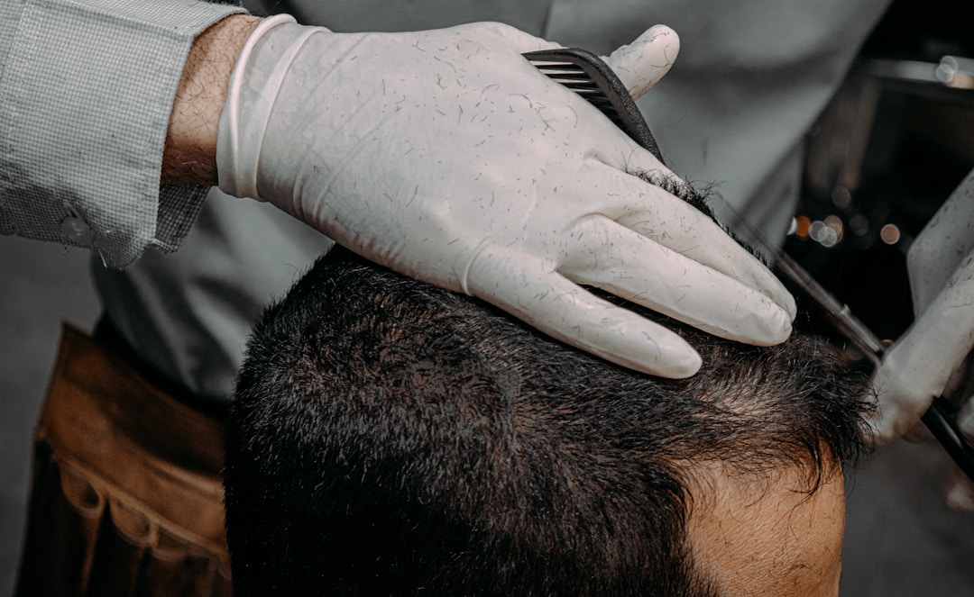 Professional precision high and tight haircut cutting techniques at DIDA NYC Hair Studio Queens