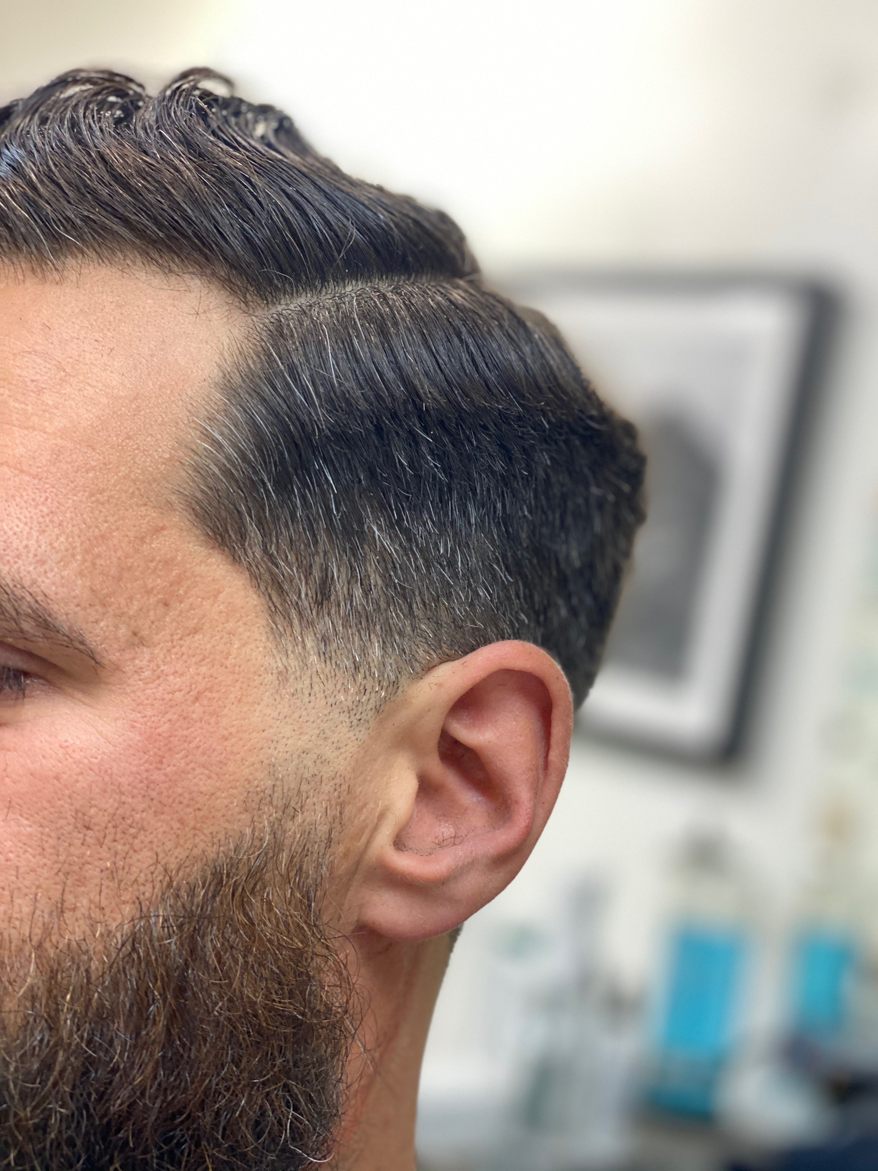 Professional super skin fade haircut at DIDA Hair Studio Queens NYC - expert fade cutting technique