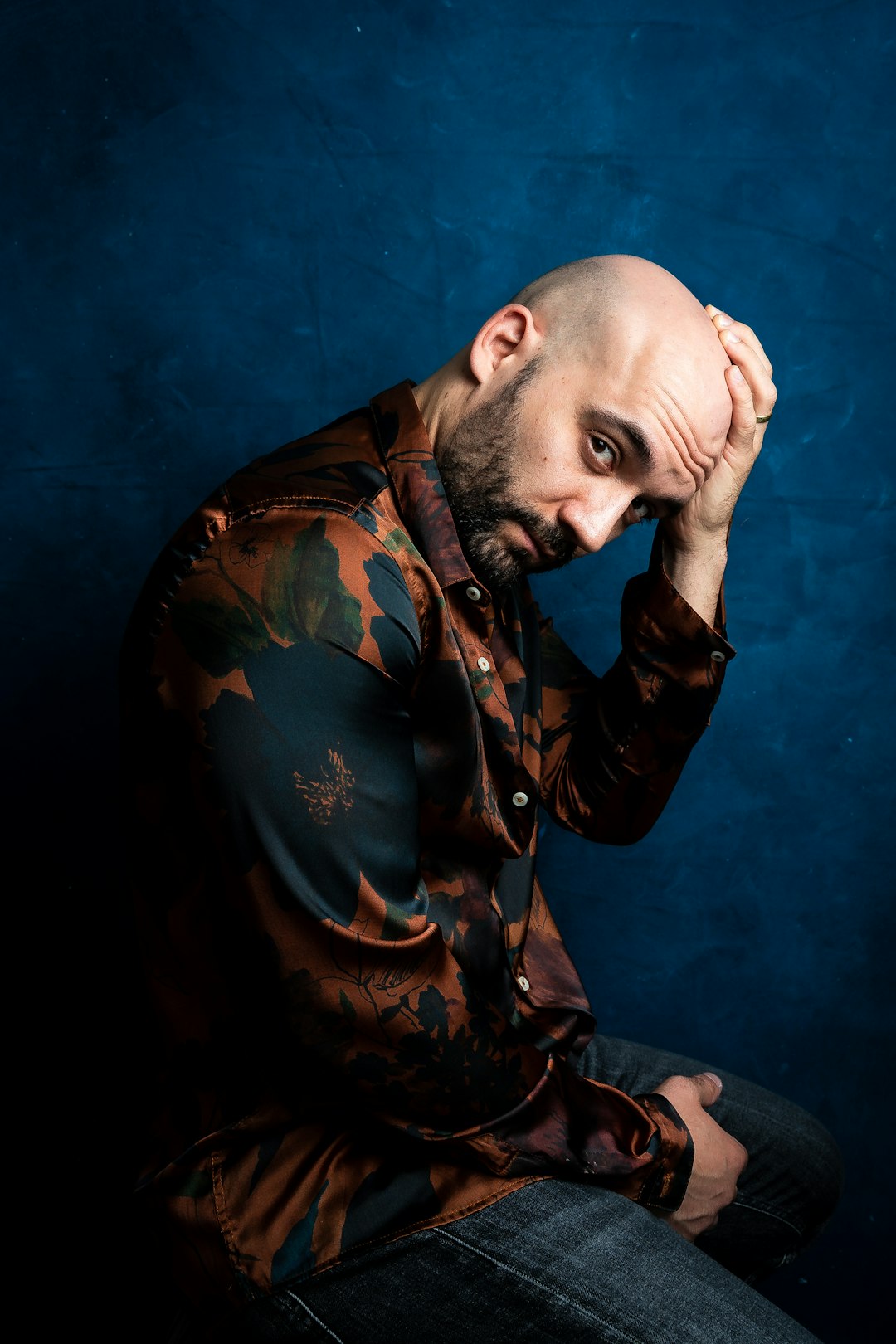 Before SMP treatment showing hair loss concerns and scalp micropigmentation consultation at professional barbershop in Queens NYC